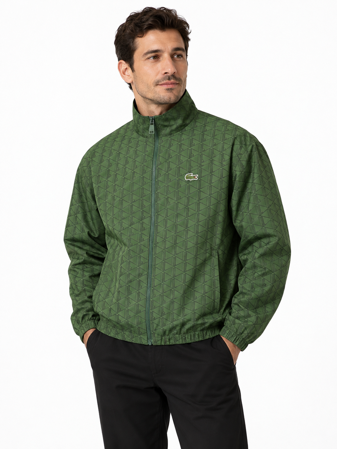 An adult model wearing the LC Monogram Zip-Through Jacket in Green.